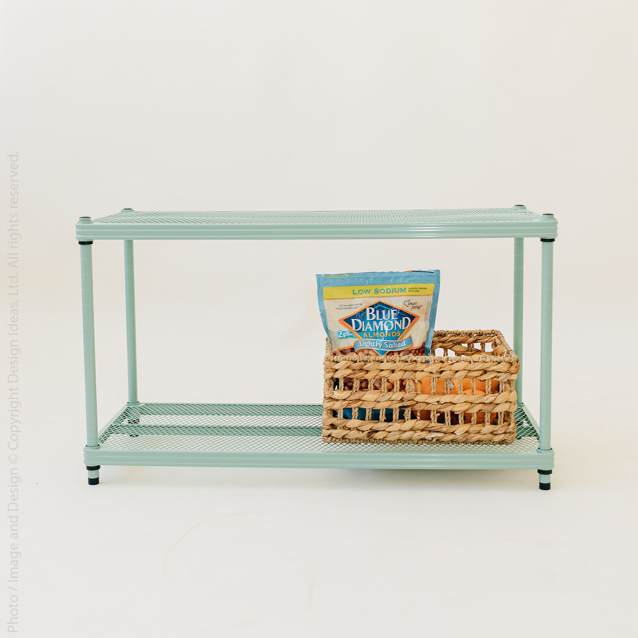 Mint green unit with basket and product