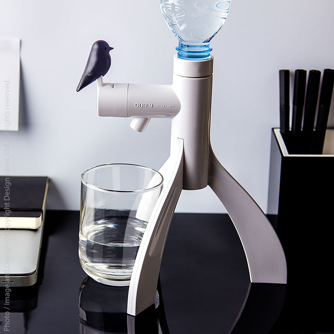 Thirsty bird bottled water dispenser